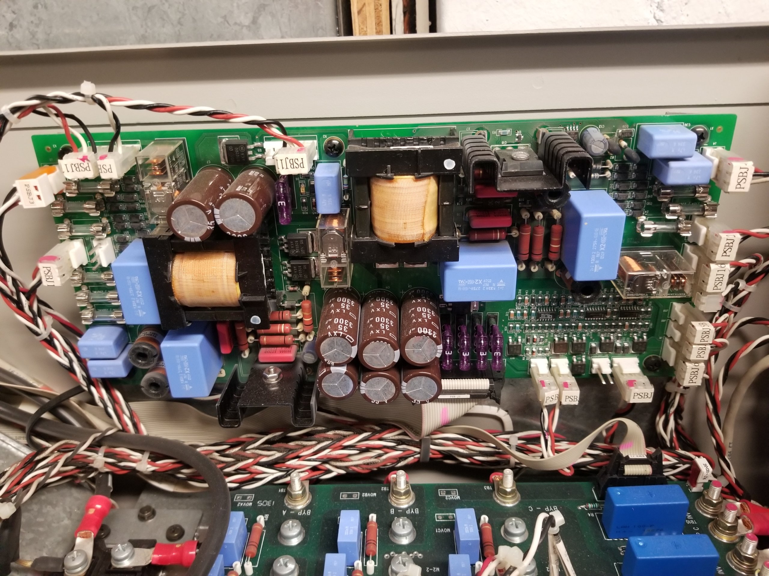 the circuit board of a 15-year-old Eaton 9330 UPS system