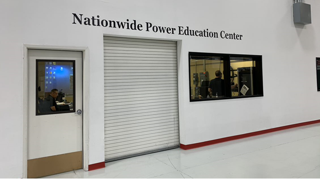 a white wall with the words Nationwide Power Education Center on it